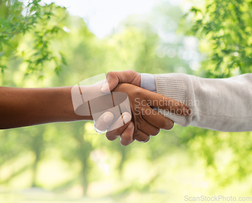 Image of handshake of people with different ethnicity