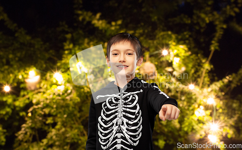 Image of boy in halloween costume of skeleton