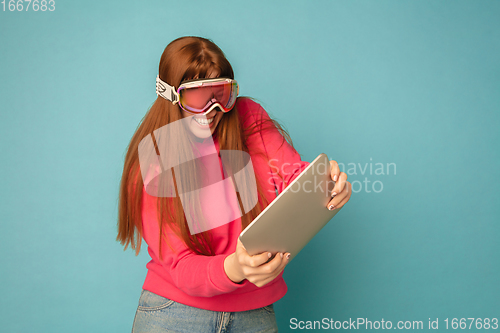 Image of Caucasian woman\'s portrait isolated on blue studio background with copyspace