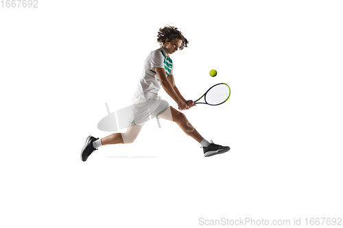 Image of Young caucasian professional sportsman playing tennis isolated on white background