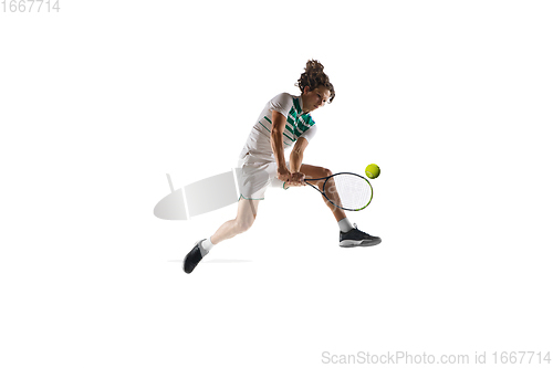 Image of Young caucasian professional sportsman playing tennis isolated on white background