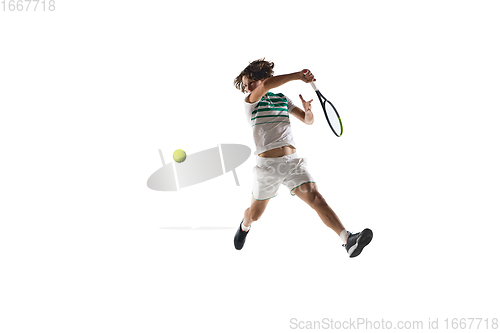 Image of Young caucasian professional sportsman playing tennis isolated on white background