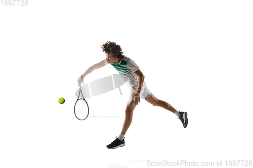 Image of Young caucasian professional sportsman playing tennis isolated on white background
