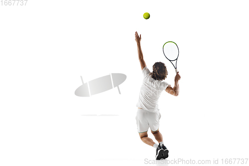 Image of Young caucasian professional sportsman playing tennis isolated on white background