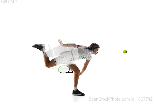 Image of Young caucasian professional sportsman playing tennis isolated on white background