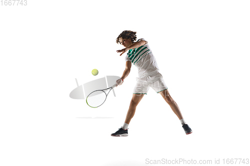 Image of Young caucasian professional sportsman playing tennis isolated on white background