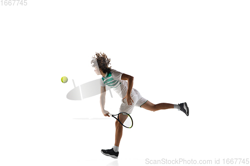 Image of Young caucasian professional sportsman playing tennis isolated on white background