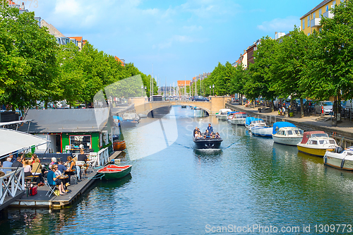 Image of People canal boat restaurant Copenhagen
