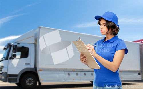 Image of delivery girl with clipboard and pen writing