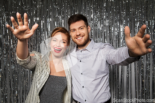 Image of happy couple in party clothes