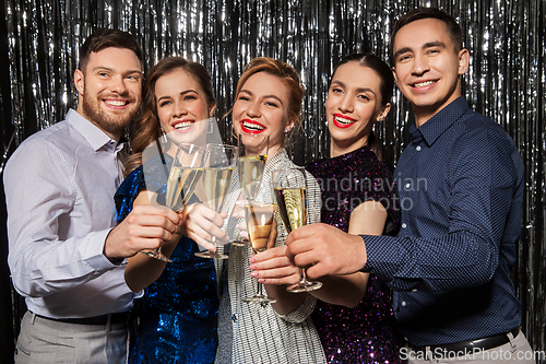 Image of friends with champagne glasses at party