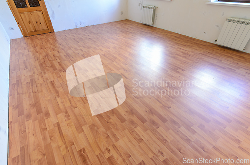 Image of Laminate on the floor of the room after a major overhaul in the apartment