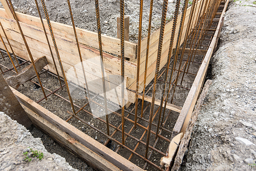 Image of The angle of the strip foundation in preparation for concreting and reinforcement during the construction of a house