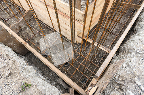 Image of Strengthening the corner of the strip foundation during the construction of the house