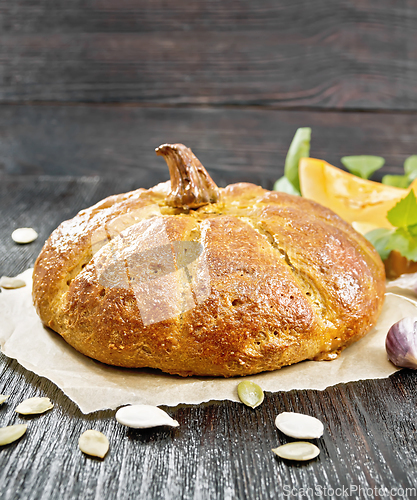 Image of Bread pumpkin on a wooden board