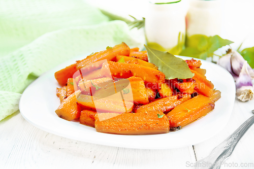 Image of Carrots fried in plate on light board