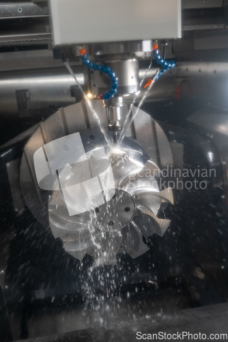 Image of Metalworking CNC milling machine. Cutting metal modern processin