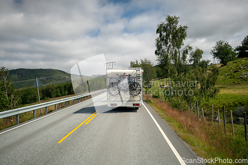 Image of VR Caravan car travels on the highway.