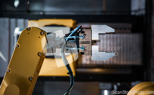 Image of Robotic Arm modern industrial technology. Automated production c