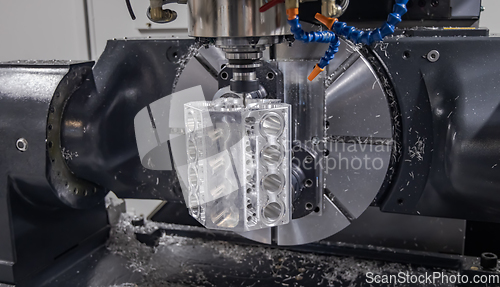 Image of Metalworking CNC milling machine. Cutting metal modern processin