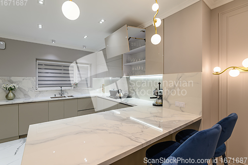 Image of Luxury white modern marble kitchen in studio space