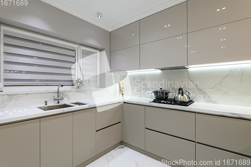 Image of Luxury white modern marble kitchen in studio space