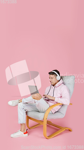 Image of Caucasian man\'s portrait isolated on pink studio background with copyspace