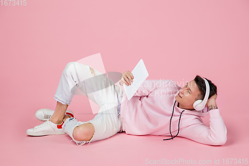 Image of Caucasian man\'s portrait isolated on pink studio background with copyspace