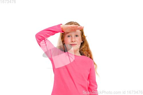 Image of Happy redhair girl isolated on white studio background. Looks happy, cheerful, sincere. Copyspace. Childhood, education, emotions concept