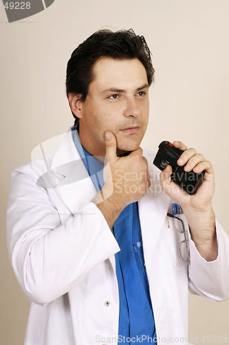 Image of Doctor recording patient information