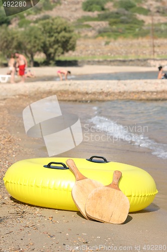 Image of beach people and toys