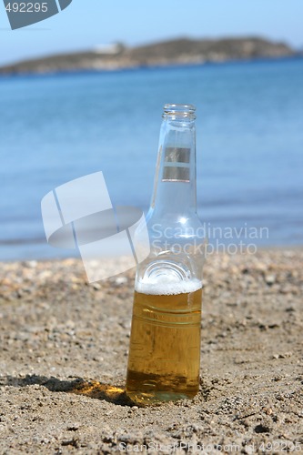 Image of beer on the beach