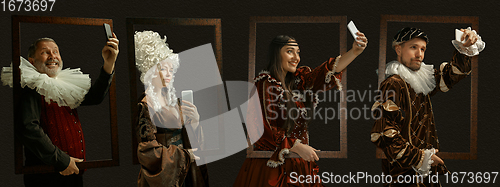 Image of Medieval people as a royalty persons in vintage clothing on dark background. Concept of comparison of eras, modernity and renaissance, baroque style.