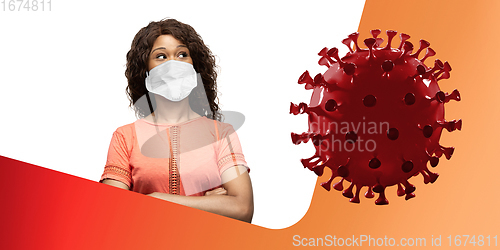 Image of Woman in protective face mask on white and orange fluid studio background. New rules of COVID spreading prevention