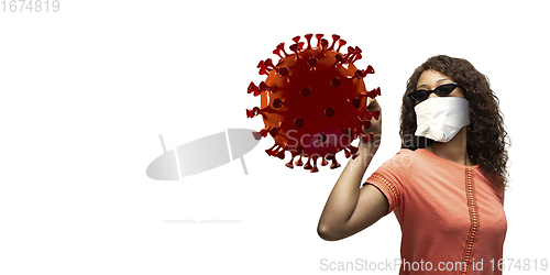 Image of Woman in protective face mask isolated on white studio background. New rules of COVID spreading prevention