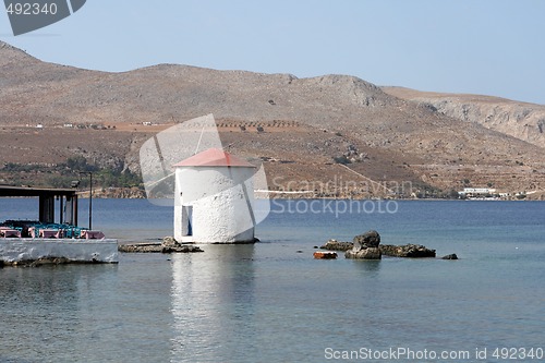 Image of water mill in sea