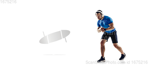 Image of Caucasian professional male runner, athlete training isolated on white studio background. Copyspace for ad.