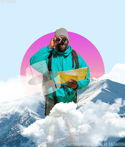 Image of Happy man traveller looking through binoculars isolated on geometric background.