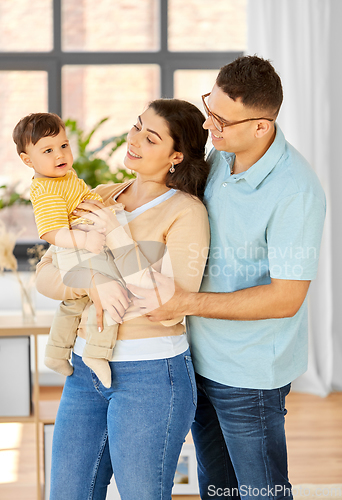 Image of happy family with child at home