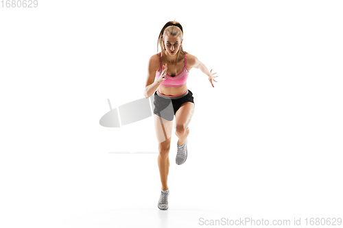 Image of Caucasian professional female runner, athlete training isolated on white studio background. Copyspace for ad.