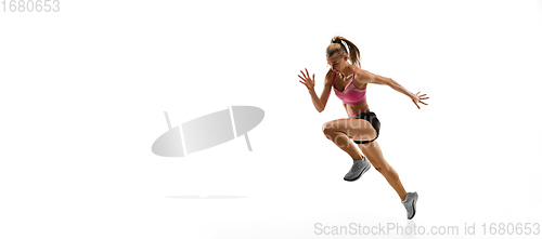 Image of Caucasian professional female runner, athlete training isolated on white studio background. Copyspace for ad.