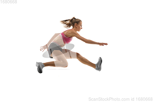 Image of Caucasian professional female runner, athlete training isolated on white studio background. Copyspace for ad.