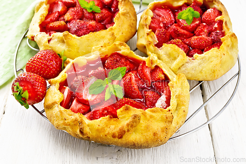 Image of Galetas with strawberries on white board