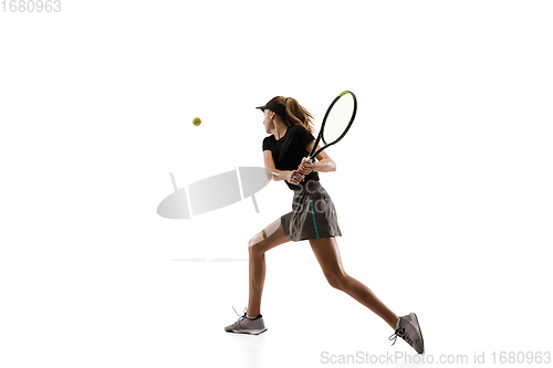 Image of Young caucasian professional sportswoman playing tennis isolated on white background