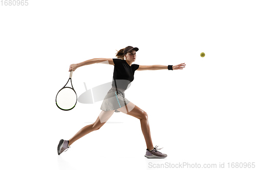 Image of Young caucasian professional sportswoman playing tennis isolated on white background