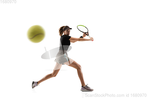 Image of Young caucasian professional sportswoman playing tennis isolated on white background