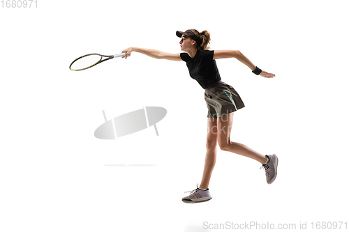 Image of Young caucasian professional sportswoman playing tennis isolated on white background