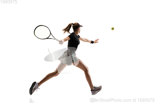 Image of Young caucasian professional sportswoman playing tennis isolated on white background