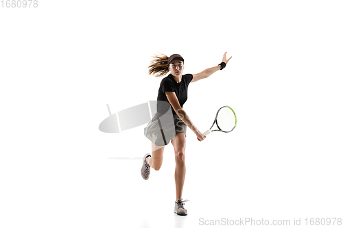 Image of Young caucasian professional sportswoman playing tennis isolated on white background