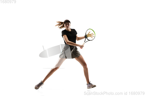 Image of Young caucasian professional sportswoman playing tennis isolated on white background